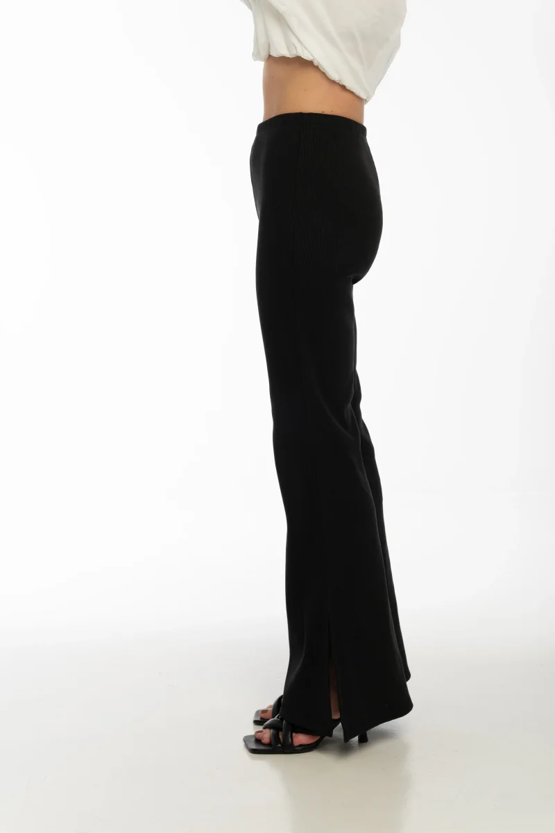 Pantalone nero a costine con spacco alla caviglia - immagine 3